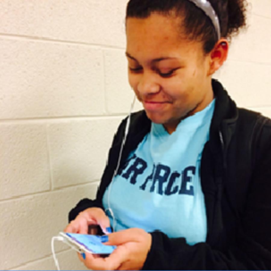 Freshman Destiny Brooks checks her phone like her usual daily routine. She says shes on her phone for about eight hours a day.