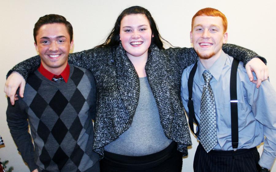 Seniors Jacob Labeau, Cynthia Caincross and Joe Sivils pose for a picture after giving speeches at the AIM banquet Dec. 16 at the Monroe Bank & Trust building. The banquet honored those students who raised their GPAs 15 percent ot higher. 