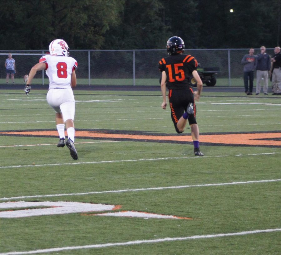  Senior Mason Petree runs a route to catch the ball. Petree plays both offense and defense.