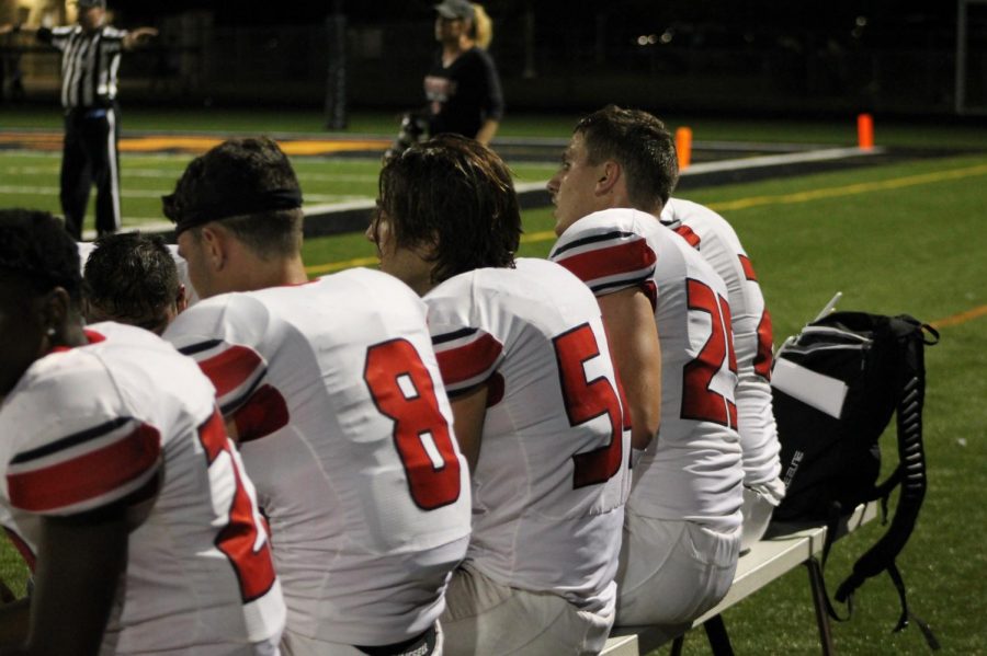 The defense watches the game while the offense is on the field. The defense held Tecumseh to only 13 points all game. 