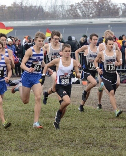 Freshman Luke Butler competes in the MHSAA Division 1 cross country state finals at Michigan International Speedway Nov. 2. He placed 133rd overall and fifth out of all freshman.