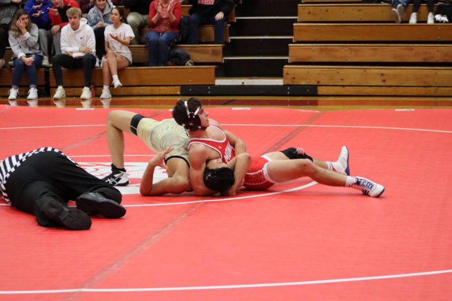 Senior Luke McColumn competes in the meet against Ypsilanti and Saline. The meet was also Senior Night for Monroe.