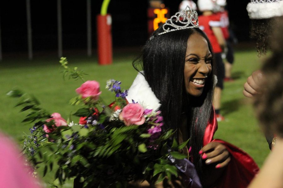 Senior Vannity Anderson smiles as she is crowned Homecoming Queen. Her crown was given to her by Parker Stamper, the 2020 Homecoming Queen.