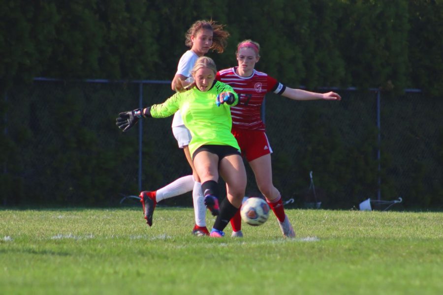Goalkeeper Ava Smith and Kyleigh Carter try to keep the ball away from the river rats. This is Smith’s final season, as she is a senior. 
